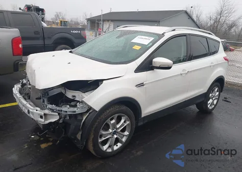 2016 Ford Escape Titanium z USA, uszkodzony, nr VIN 1FMCU9JX3GUC53779